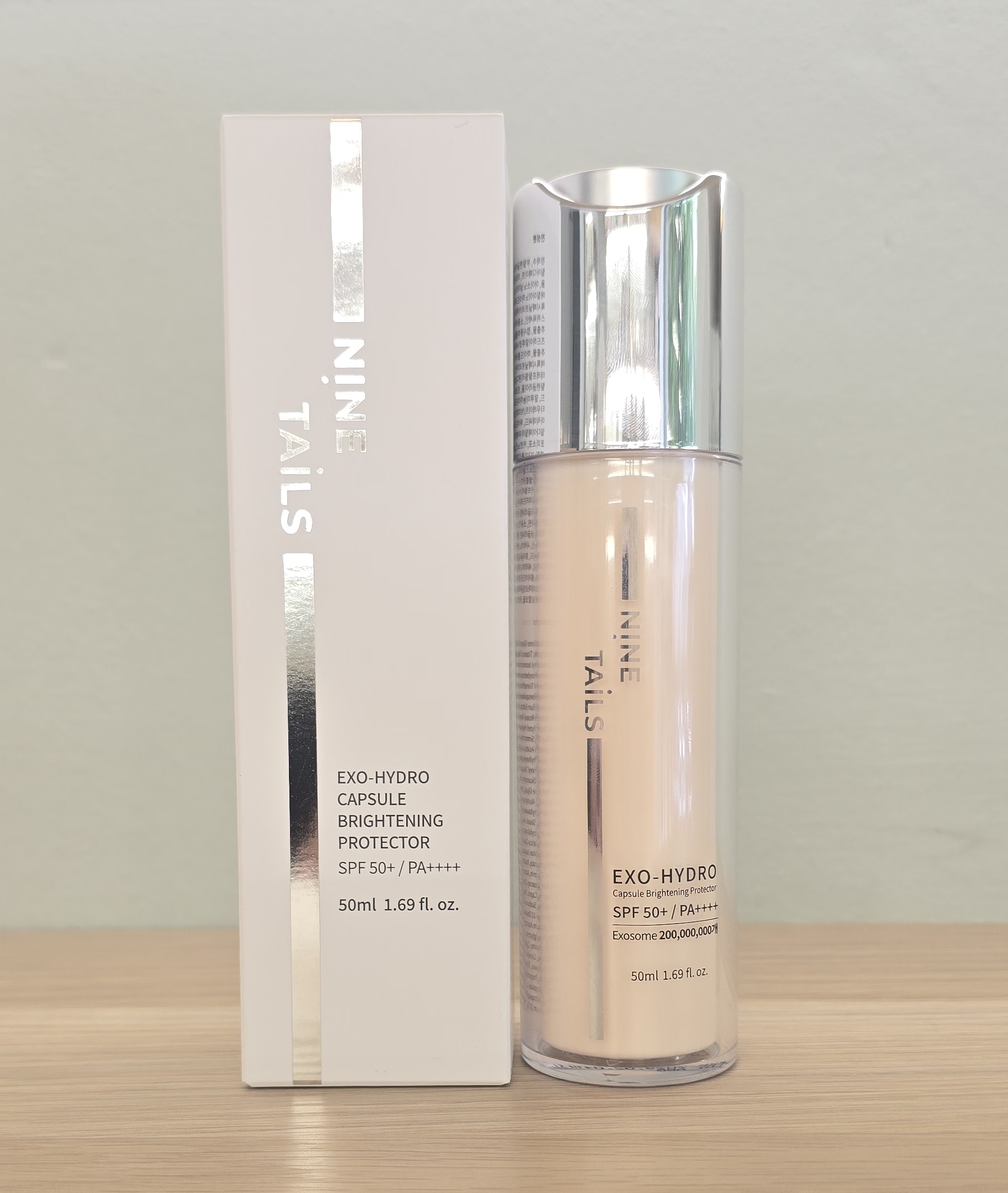 NINE TAILS Exo Hydro Capsule Brightening Protector 50ml - Crema solare illuminante
